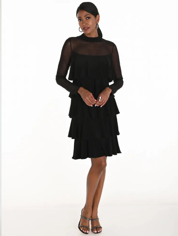 Model wearing a wedding guests dress